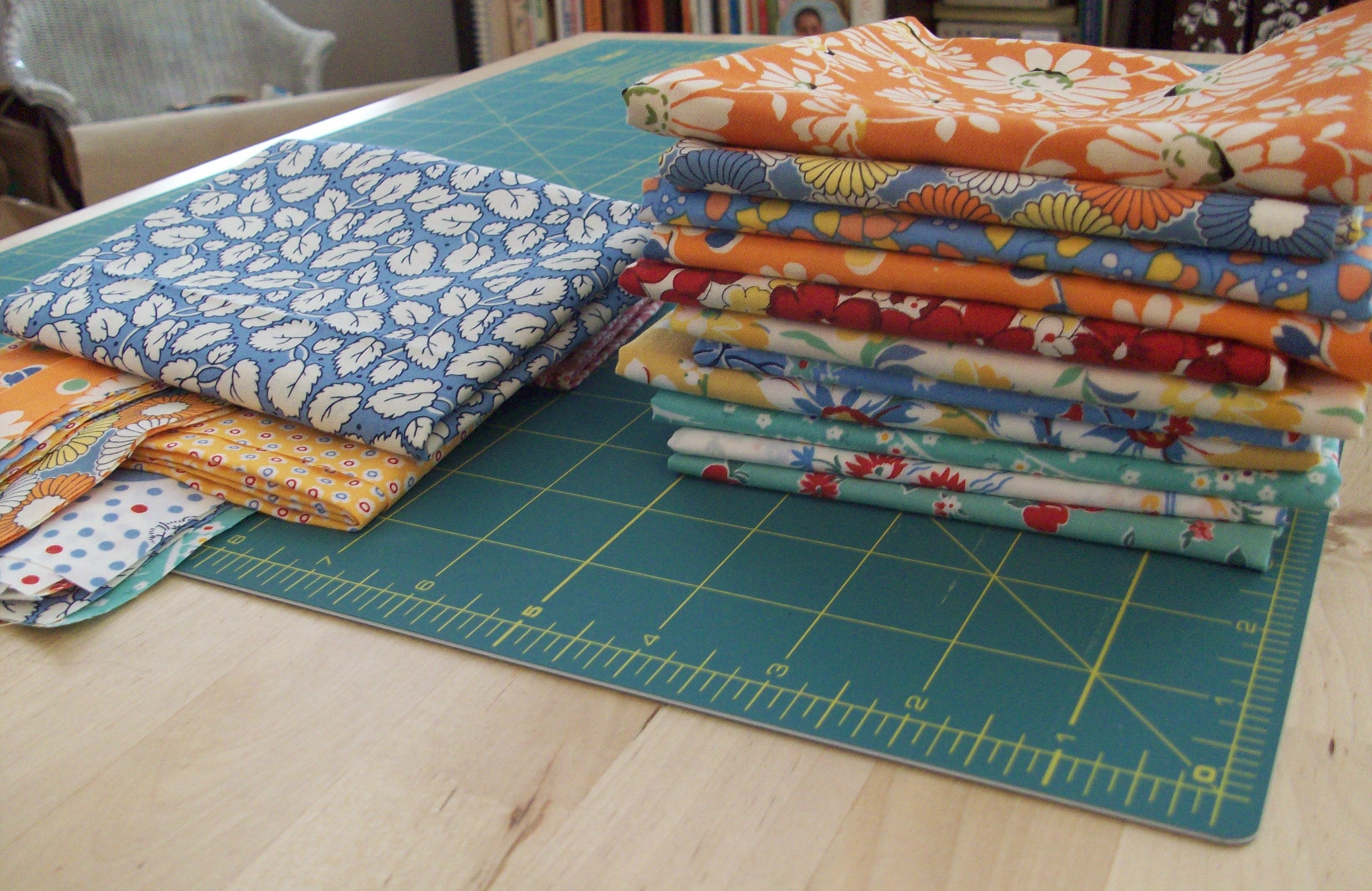 starting to cut the fabrics into strips